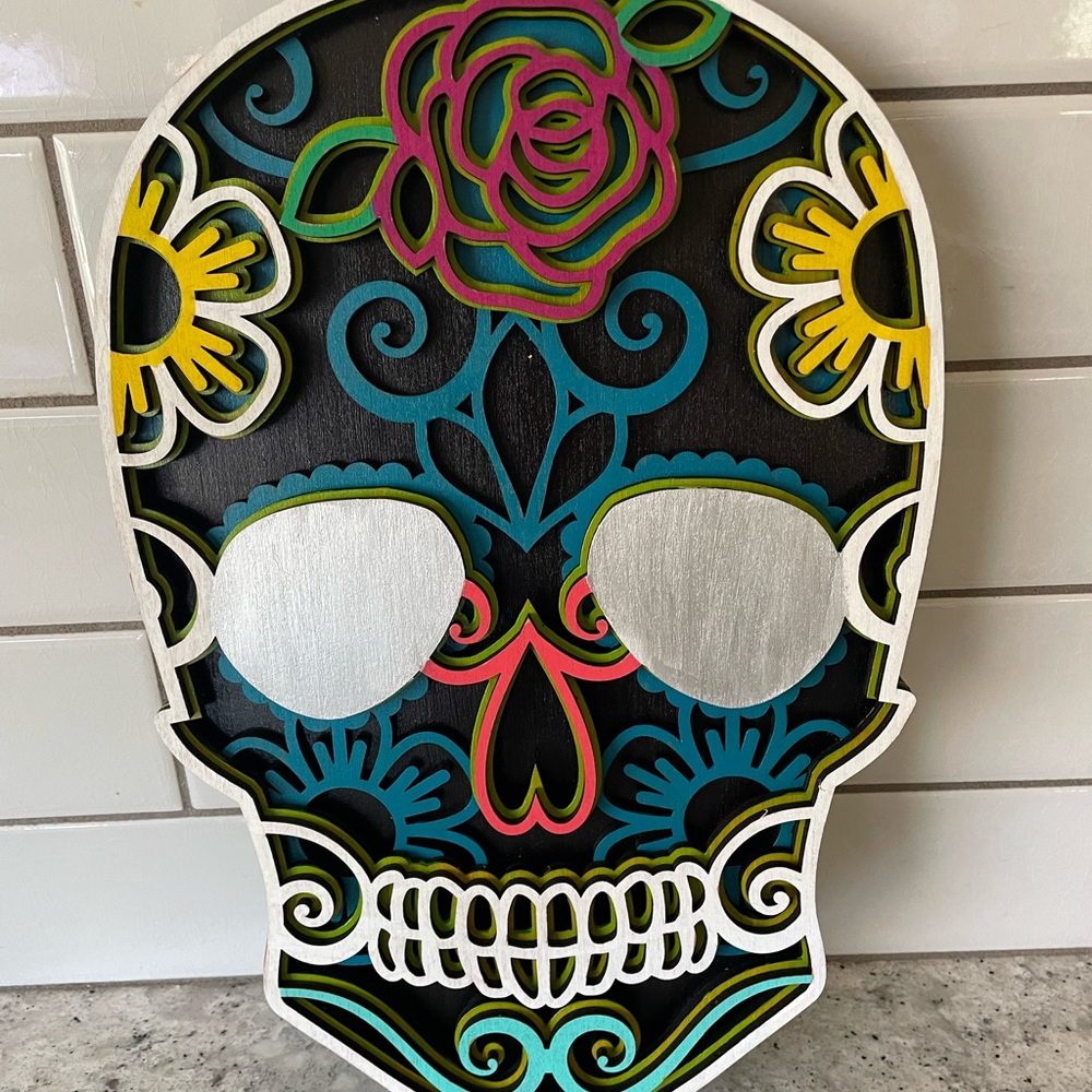 Handmade wooden 3D sugar skull.